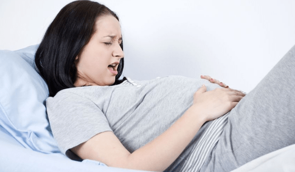 боли в животе при глистах при беременности